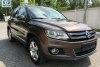 Volkswagen Tiguan HighLine + 2012.  1