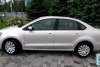 Volkswagen Polo +  2011.  4