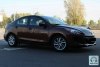 Mazda 3 Touring+ 2011.  4