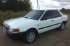 Mazda 323  1992.  1