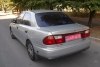 Mazda 323 - 1998.  3