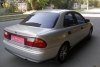 Mazda 323 - 1998.  4
