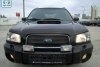 Subaru Forester  2004. ���� 4