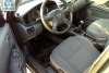 Nissan Almera 1.8� i 2006. ���� 9
