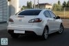 Mazda 3 Touring+ 2011.  4