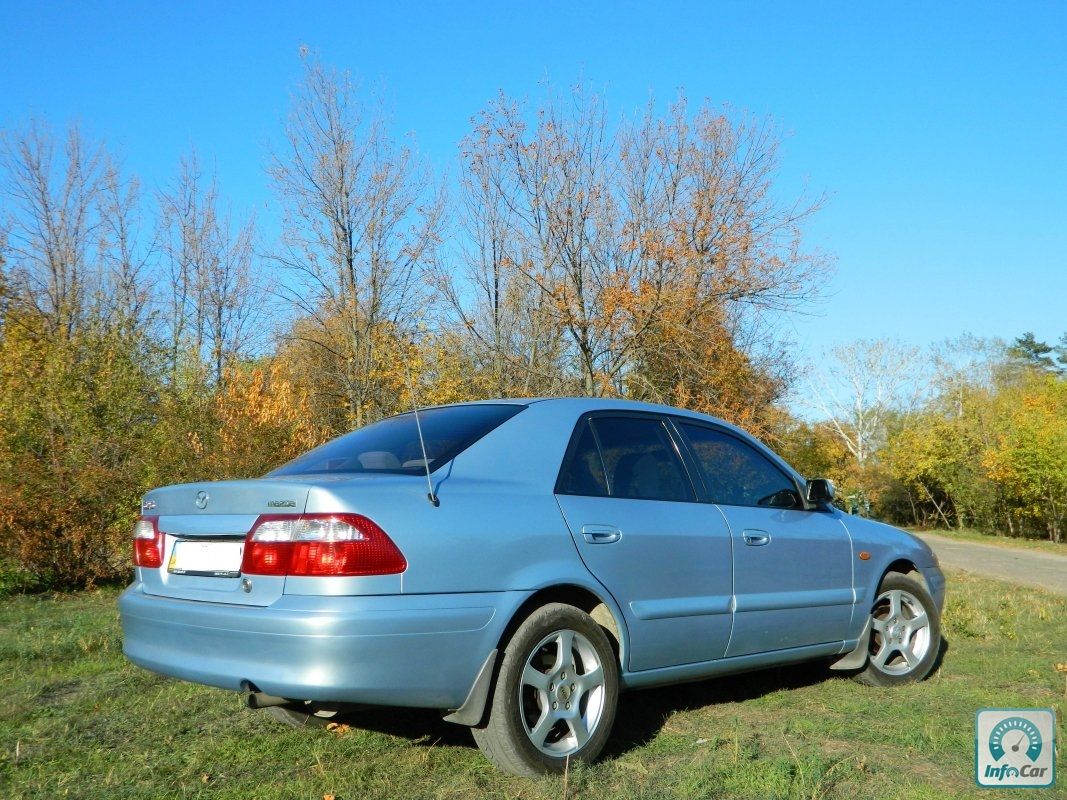 Купить автомобиль Mazda 626 GF 2002 (голубой) с пробегом