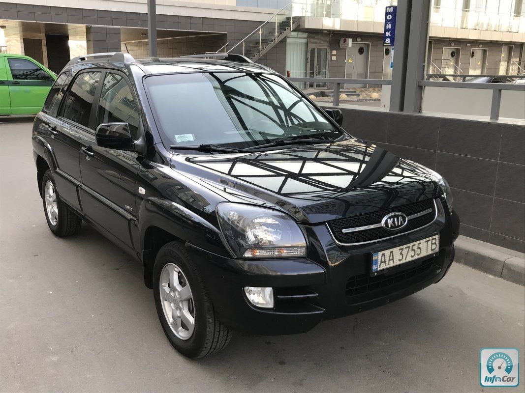 Купить автомобиль KIA Sportage 2009 (черный) с пробегом