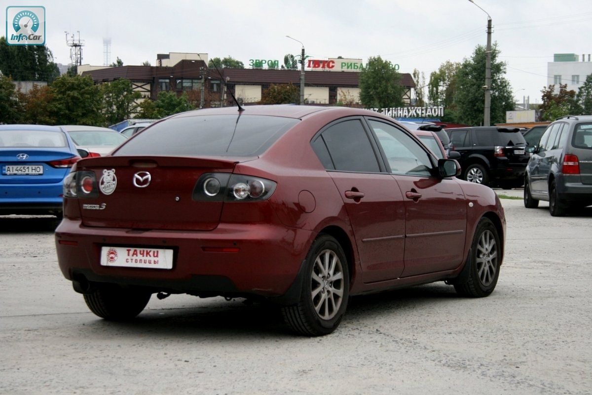 Купить автомобиль Mazda 3 2008 (красный) с пробегом