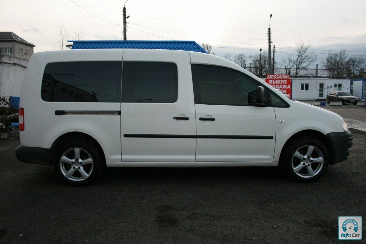 Белый volkswagen caddy