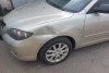 Mazda 3  4 2007.  8